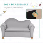 Divano ergonomico in schiuma per bambini con contenitore porta-giocattoli interno, divanetto per bambini in velluto con braccioli morbidi, mobili lounge per bambini